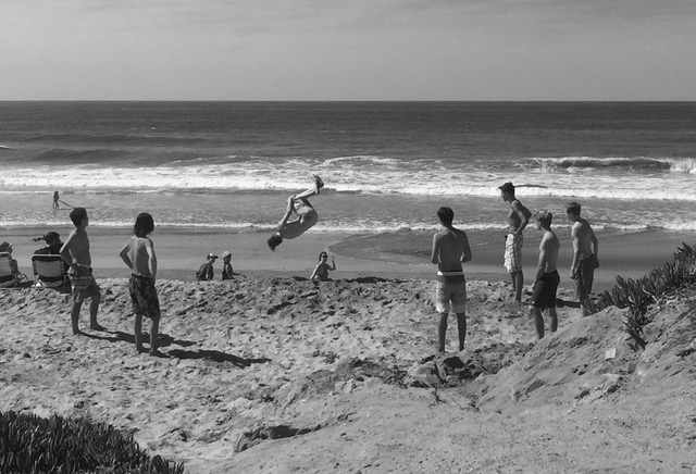 a group of people at the beach